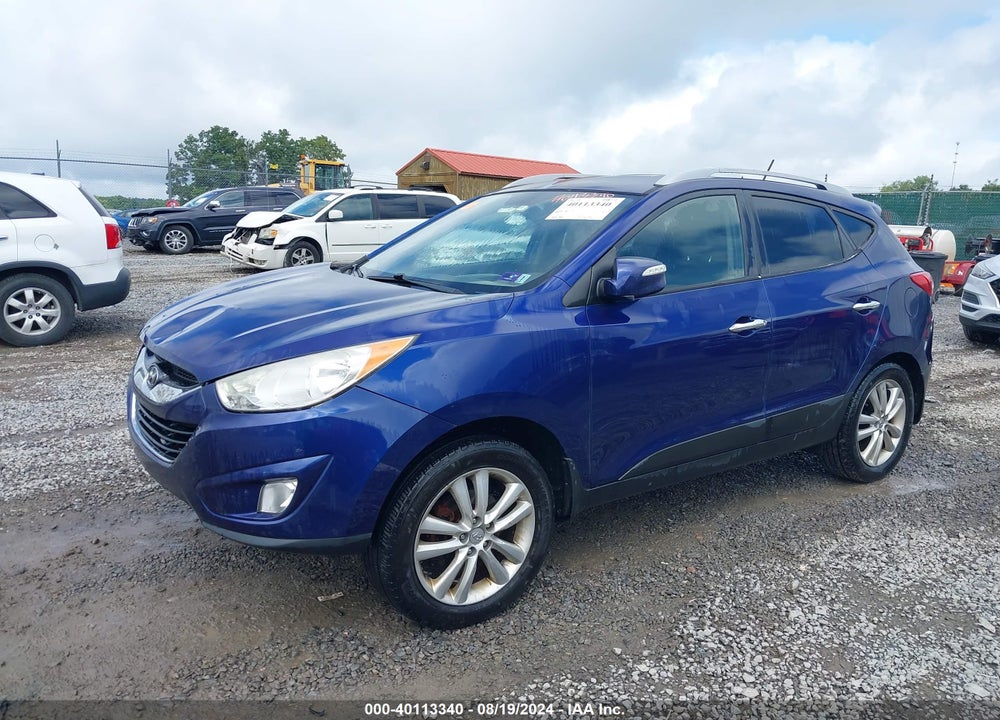 2010 HYUNDAI TUCSON LIMITED VIN: KM8JUCAC4AU063837