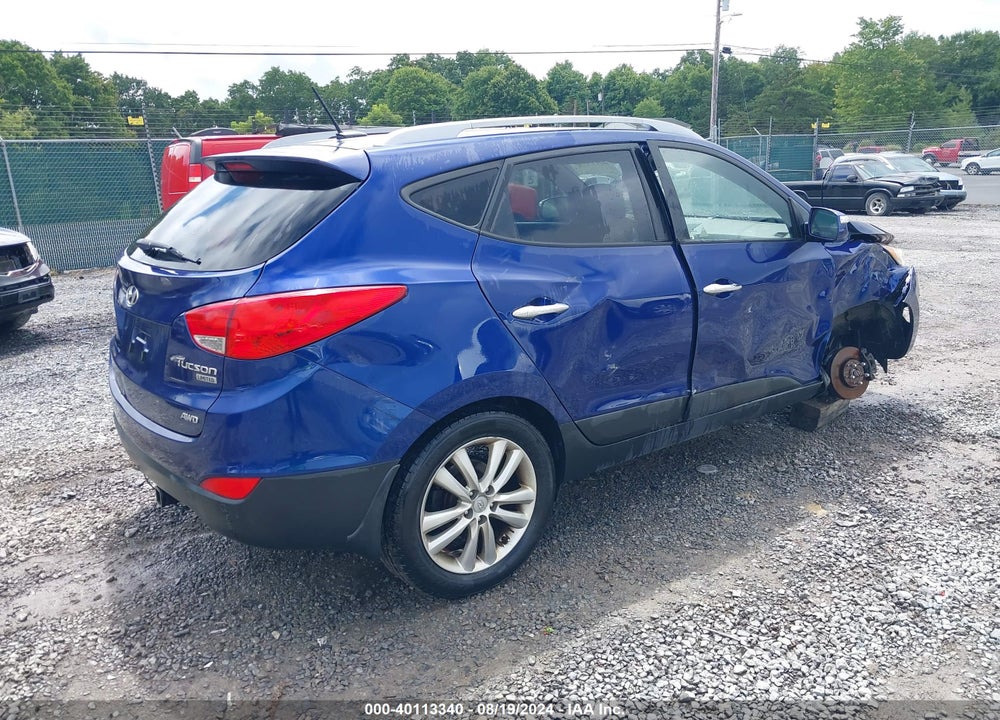 2010 HYUNDAI TUCSON LIMITED VIN: KM8JUCAC4AU063837