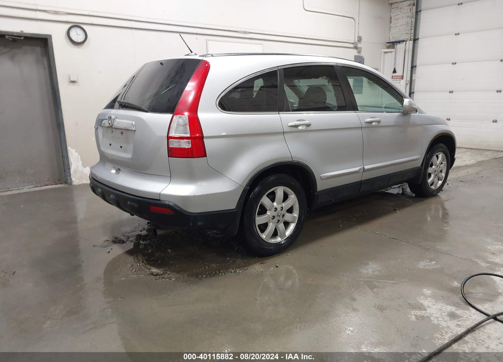 2009 HONDA CR-V EX-L VIN: JHLRE487X9C011023