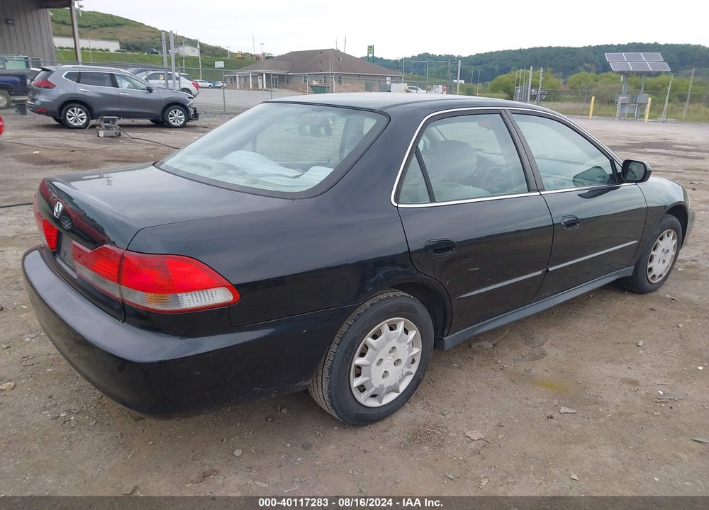 2002 HONDA ACCORD 2.3 LX VIN: 1HGCG56402A057894