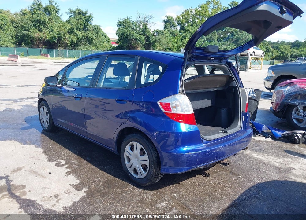 2009 HONDA FIT VIN: JHMGE88209S042043