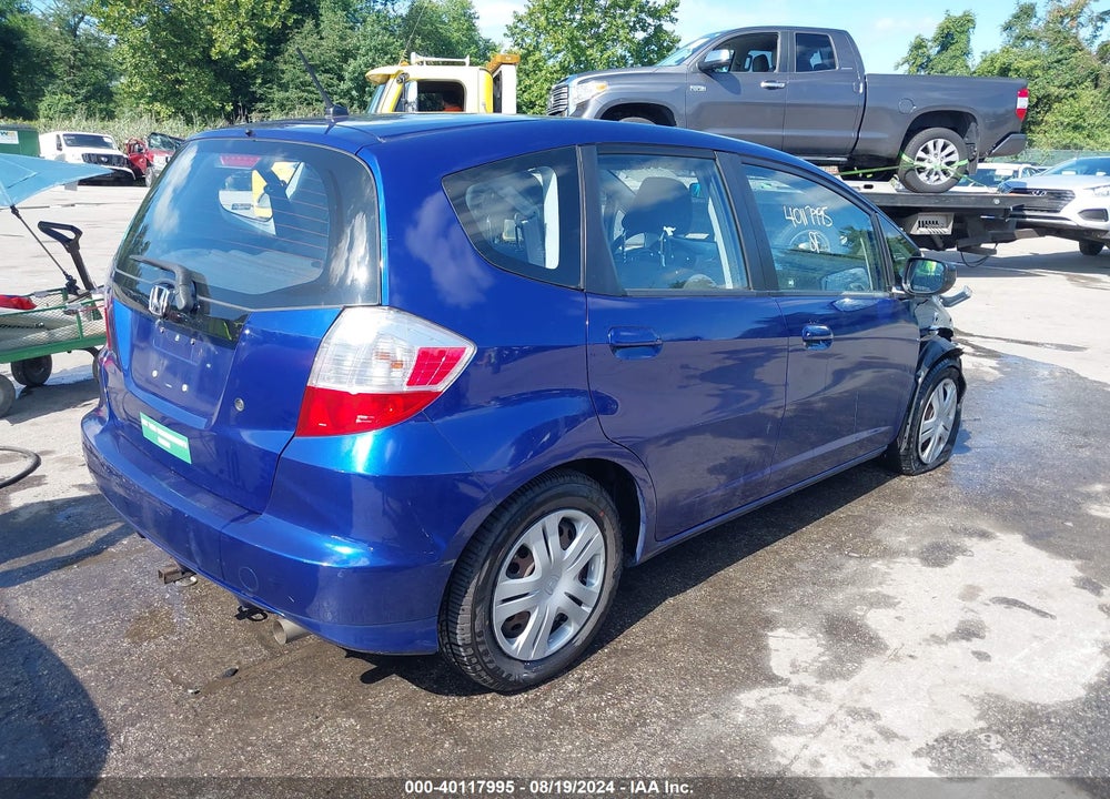 2009 HONDA FIT VIN: JHMGE88209S042043