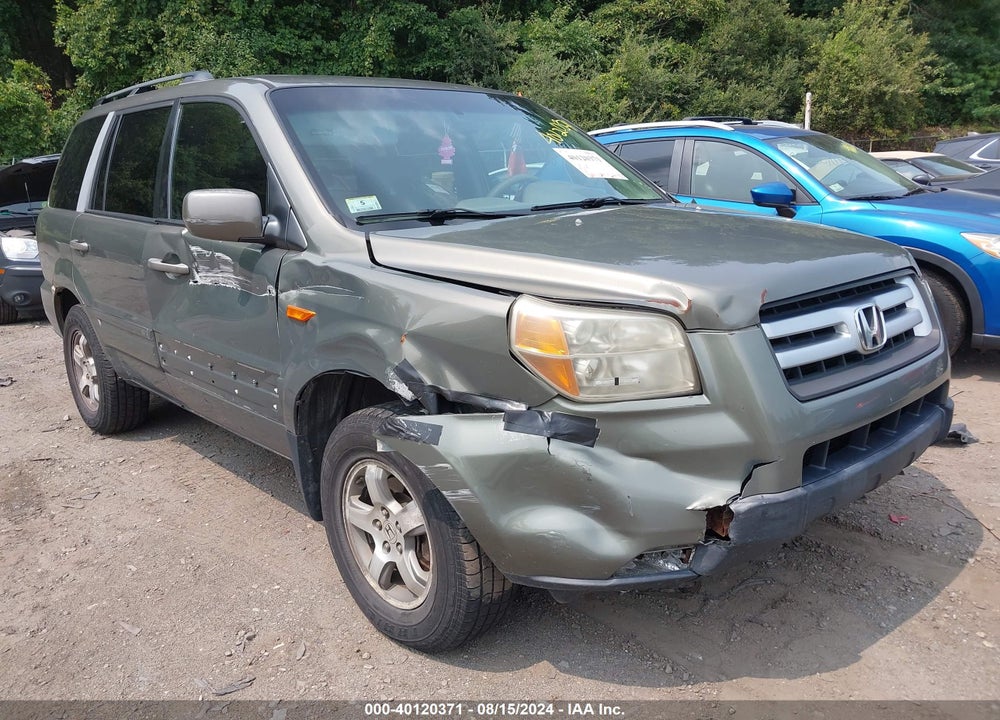 2007 HONDA PILOT EX-L VIN: 2HKYF18537H520620
