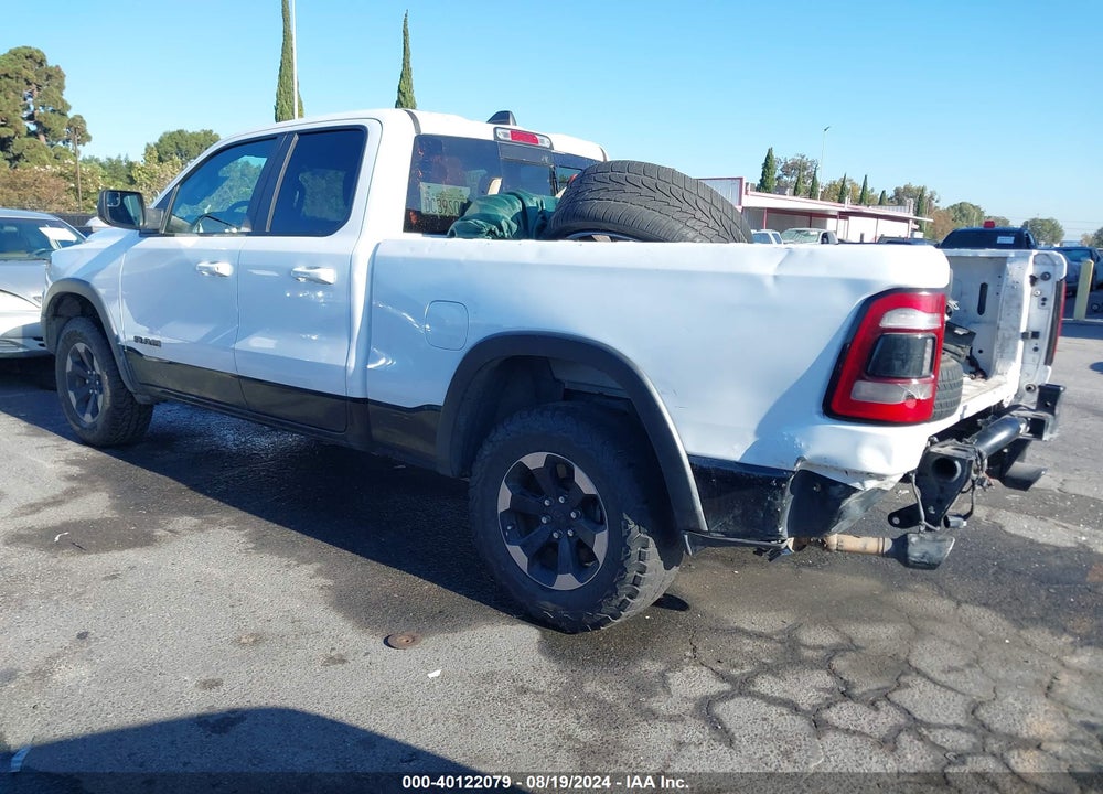 2019 RAM 1500 REBEL QUAD CAB 4X4 6'4 BOX VIN: 1C6SRFET8KN826290