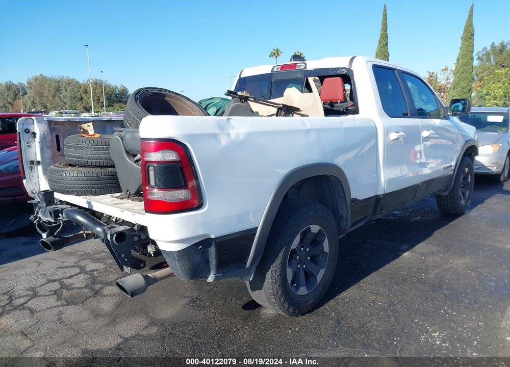 2019 RAM 1500 REBEL QUAD CAB 4X4 6'4 BOX VIN: 1C6SRFET8KN826290