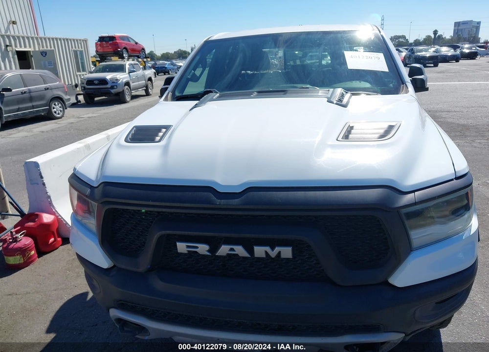 2019 RAM 1500 REBEL QUAD CAB 4X4 6'4 BOX VIN: 1C6SRFET8KN826290
