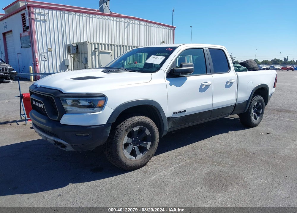 2019 RAM 1500 REBEL QUAD CAB 4X4 6'4 BOX VIN: 1C6SRFET8KN826290