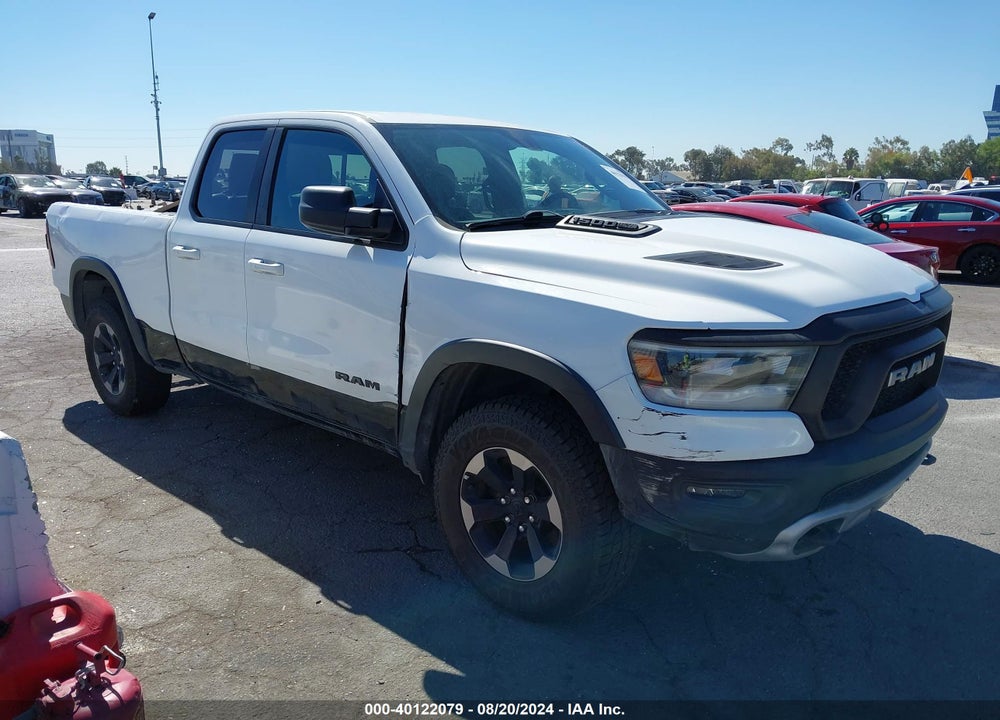 2019 RAM 1500 REBEL QUAD CAB 4X4 6'4 BOX VIN: 1C6SRFET8KN826290