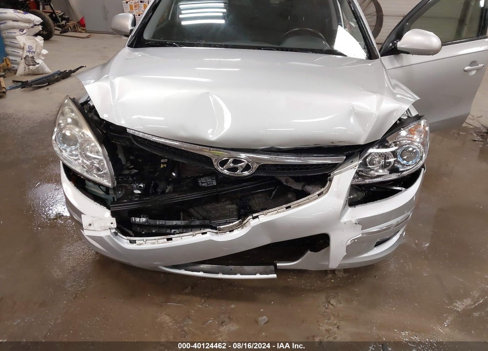 2009 HYUNDAI ELANTRA TOURING VIN: KMHDC86E29U046330
