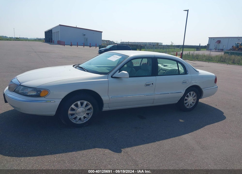 2001 LINCOLN CONTINENTAL VIN: 1LNHM97V61Y704733