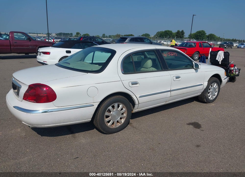 2001 LINCOLN CONTINENTAL VIN: 1LNHM97V61Y704733