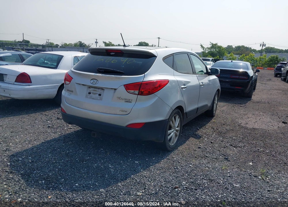 2012 HYUNDAI TUCSON LIMITED VIN: KM8JUCAC2CU383385