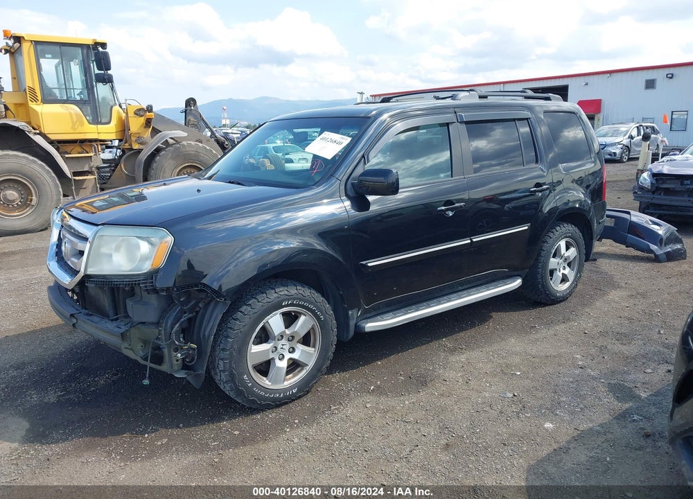 2011 HONDA PILOT EX-L VIN: 5FNYF4H51BB025017