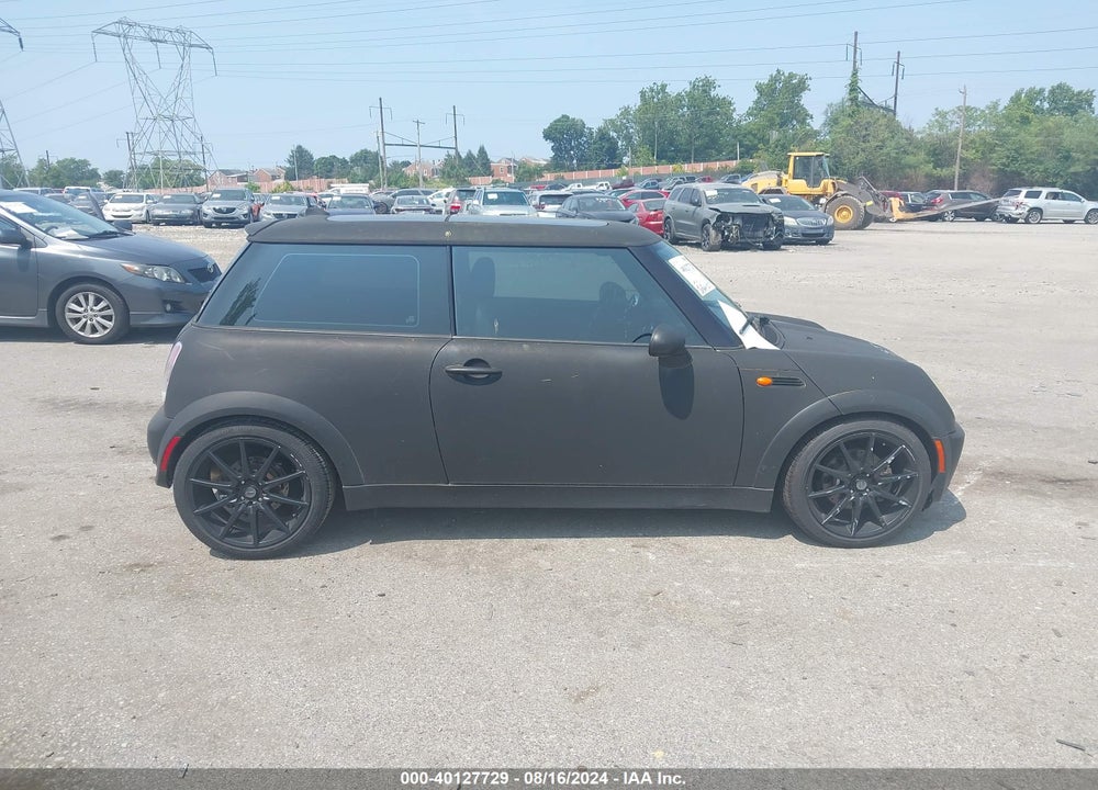 2006 MINI COOPER VIN: WMWRC33576TK65011