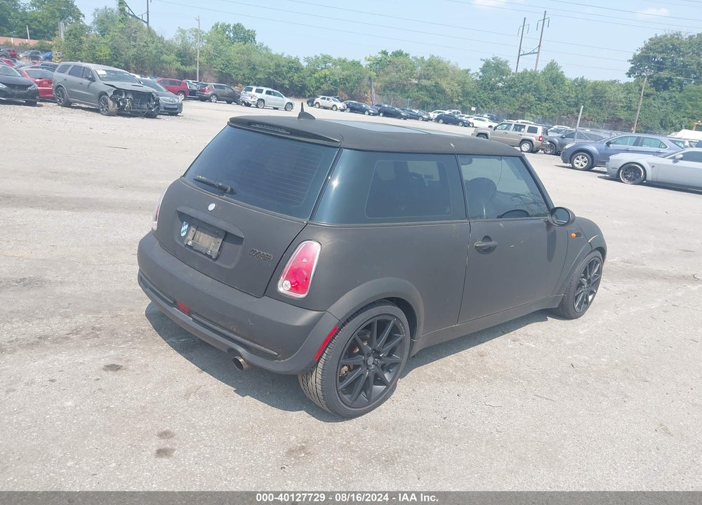 2006 MINI COOPER VIN: WMWRC33576TK65011