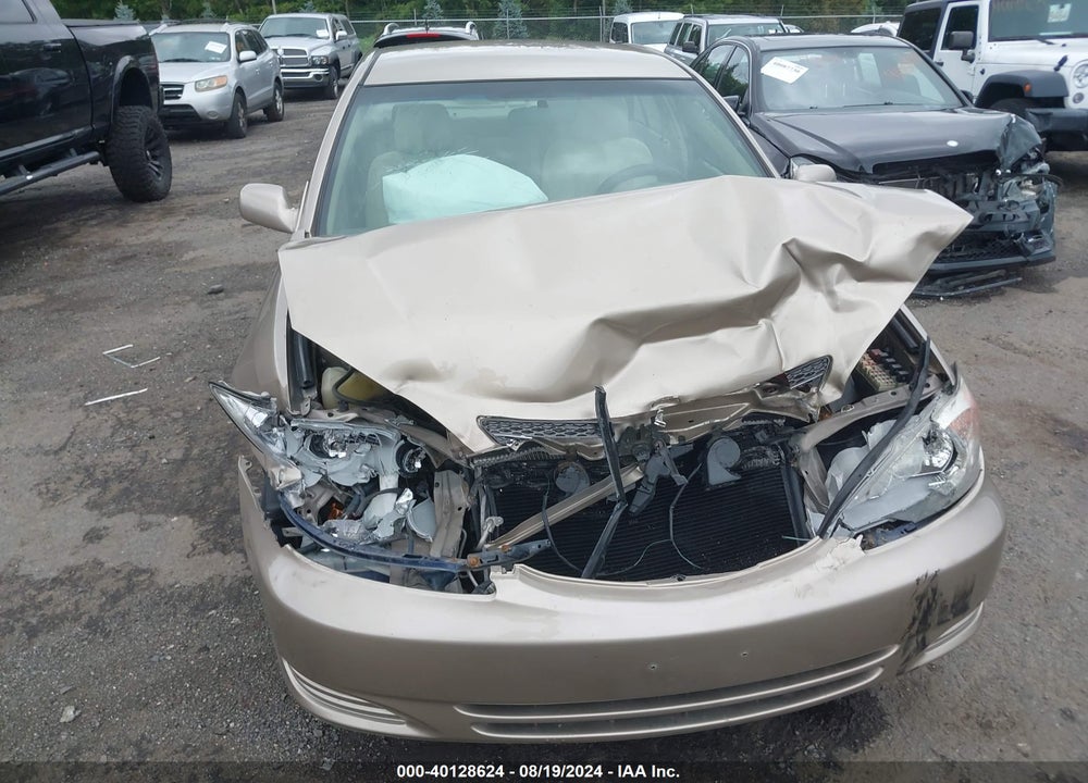 2003 TOYOTA CAMRY LE VIN: JTDBE32K430158131