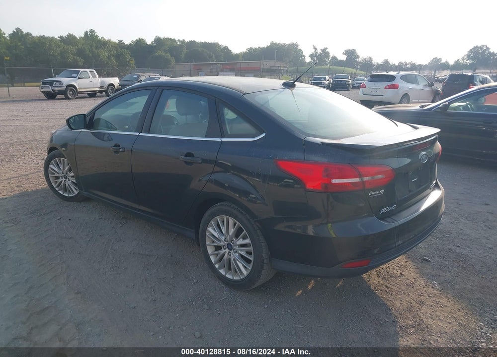 2015 FORD FOCUS TITANIUM VIN: 1FADP3J26FL273309