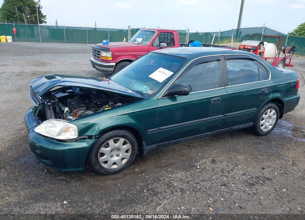 1999 HONDA CIVIC LX VIN: 2HGEJ6677XH568487