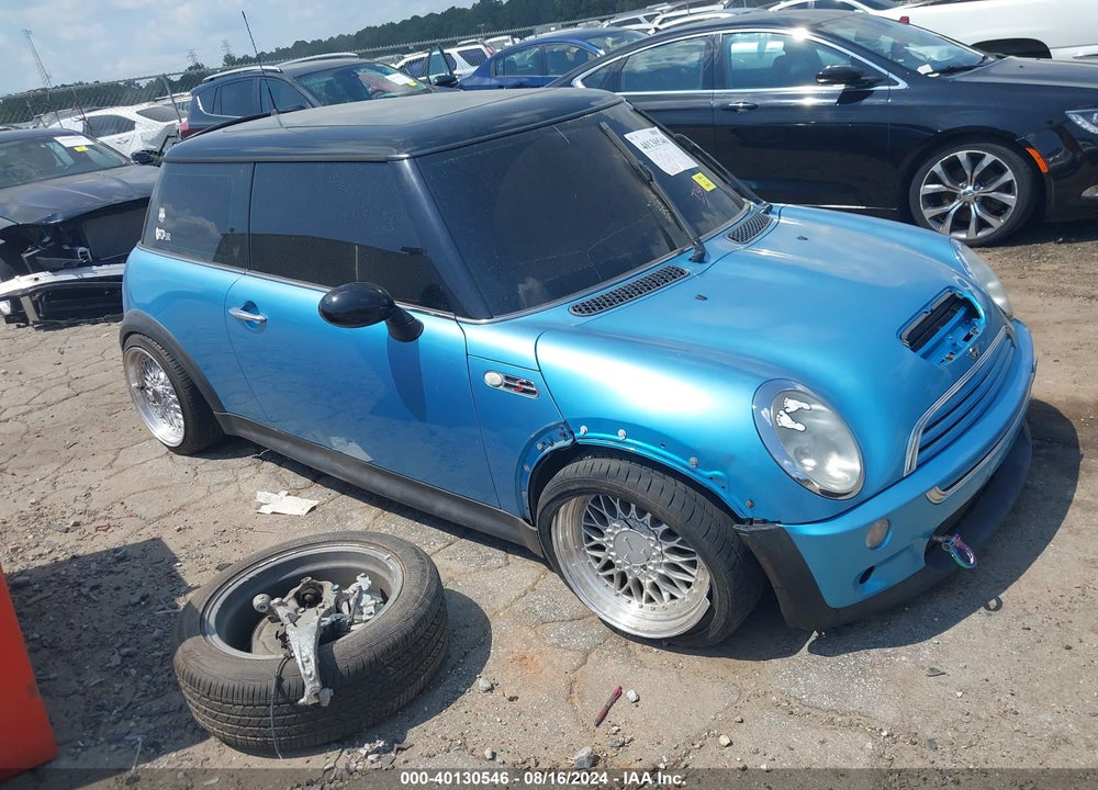 2002 MINI COOPER S VIN: WMWRE33412TD52577