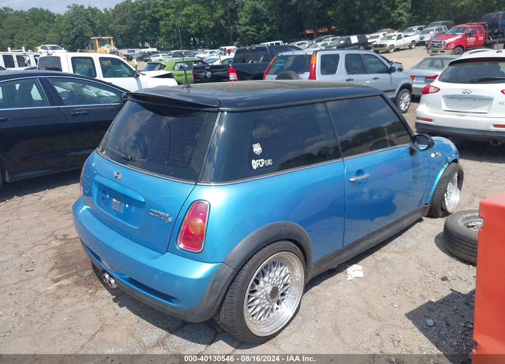2002 MINI COOPER S VIN: WMWRE33412TD52577