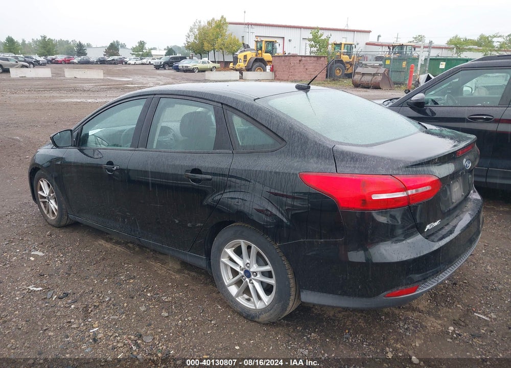2016 FORD FOCUS VIN: 1FADP3F21GL293235