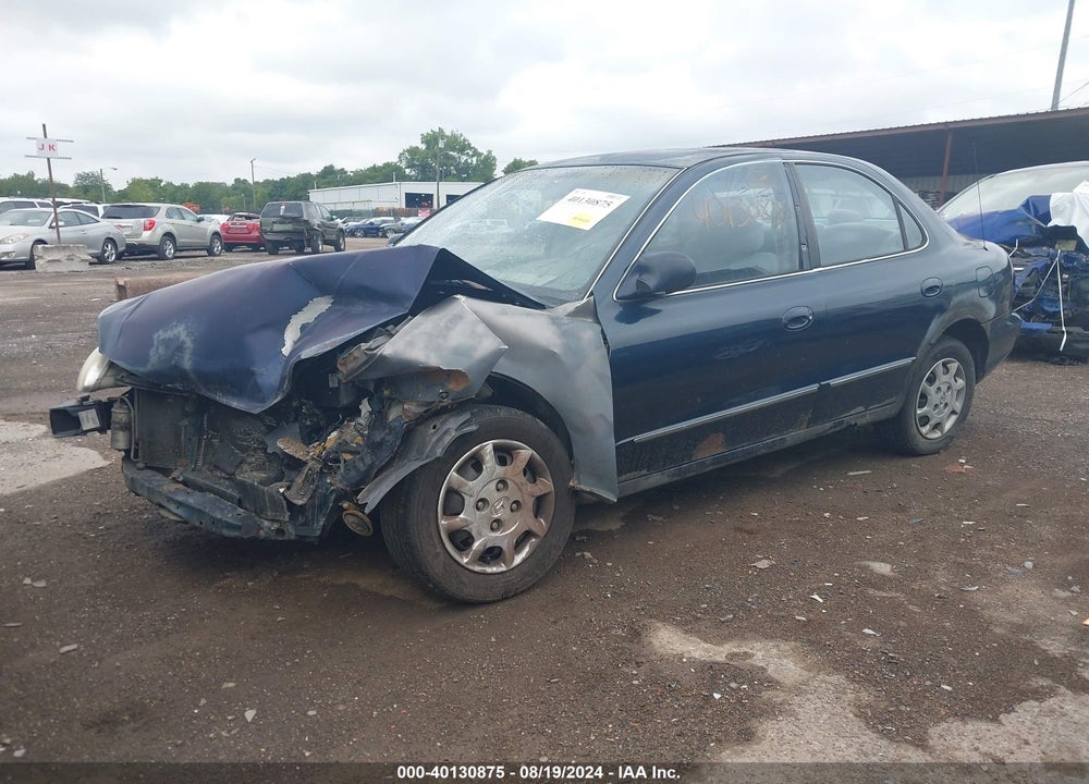 2000 HYUNDAI ELANTRA GLS VIN: KMHJF35F6YU051049