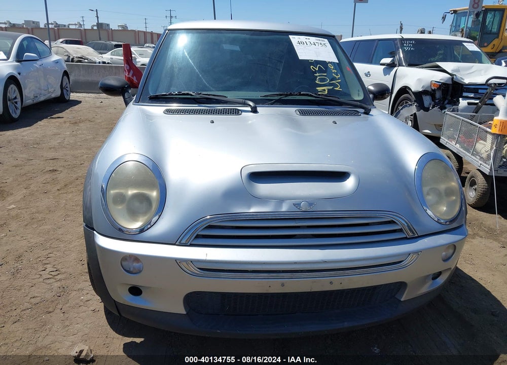 2004 MINI COOPER S VIN: WMWRE33414TD82729