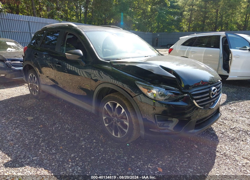 2016 MAZDA CX-5 GRAND TOURING VIN: JM3KE4DY4G0701031