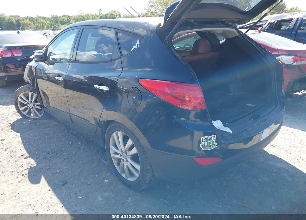 2012 HYUNDAI TUCSON LIMITED VIN: KM8JUCAC7CU434332