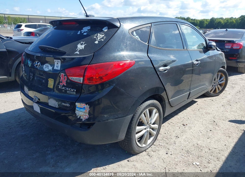 2012 HYUNDAI TUCSON LIMITED VIN: KM8JUCAC7CU434332