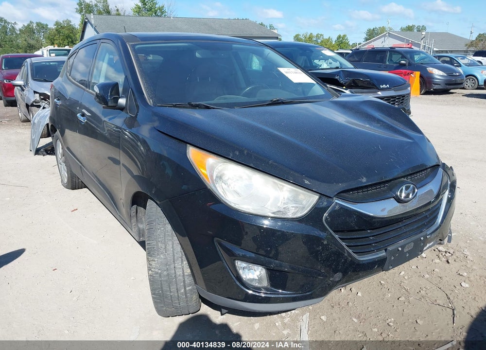 2012 HYUNDAI TUCSON LIMITED VIN: KM8JUCAC7CU434332