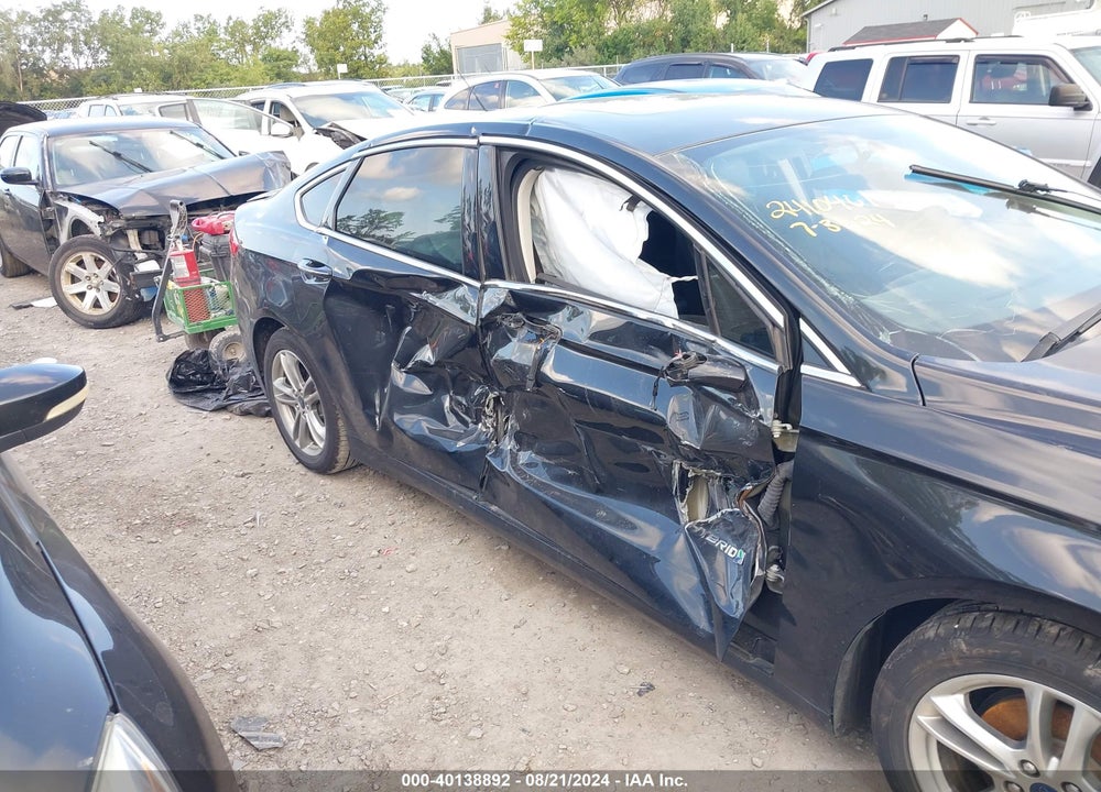 2015 FORD FUSION TITANIUM HYBRID VIN: 3FA6P0RU4FR201216