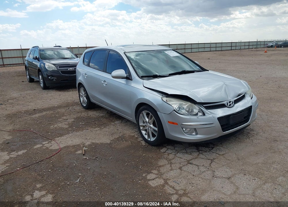 2009 HYUNDAI ELANTRA TOURING VIN: KMHDC86E79U037574