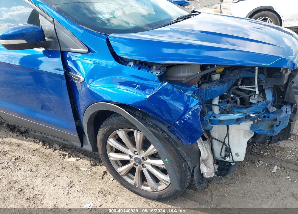 2017 FORD ESCAPE TITANIUM VIN: 1FMCU0JD9HUD74495