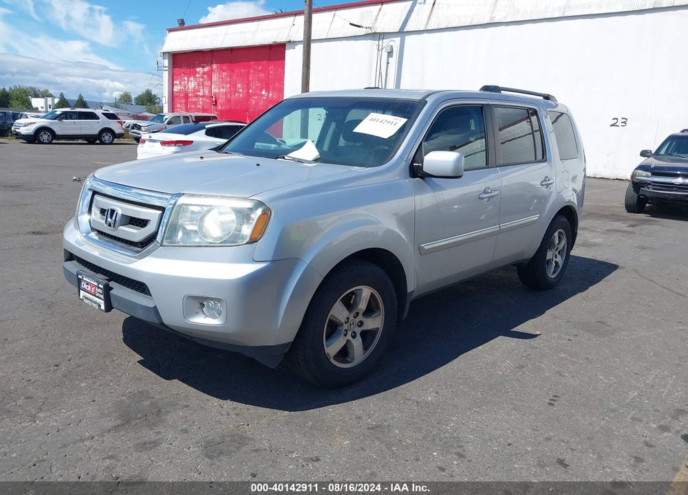 2011 HONDA PILOT EX-L VIN: 5FNYF4H51BB061824