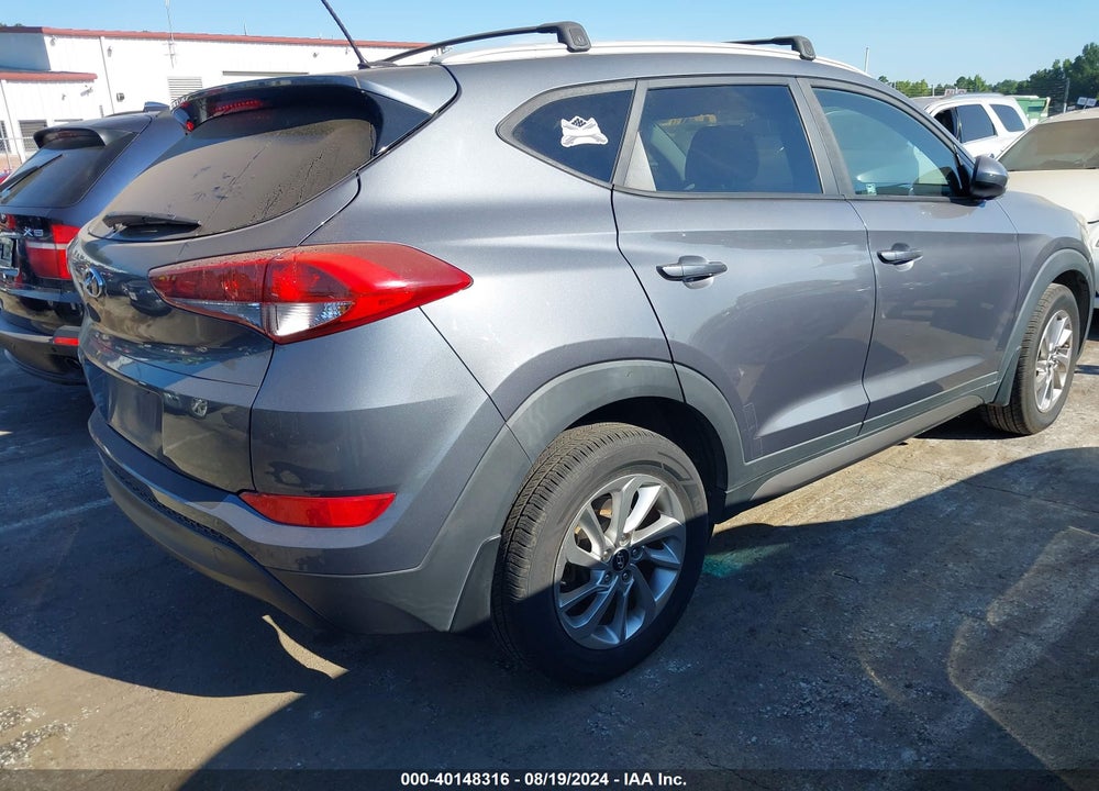 2016 HYUNDAI TUCSON SE VIN: KM8J33A42GU197136