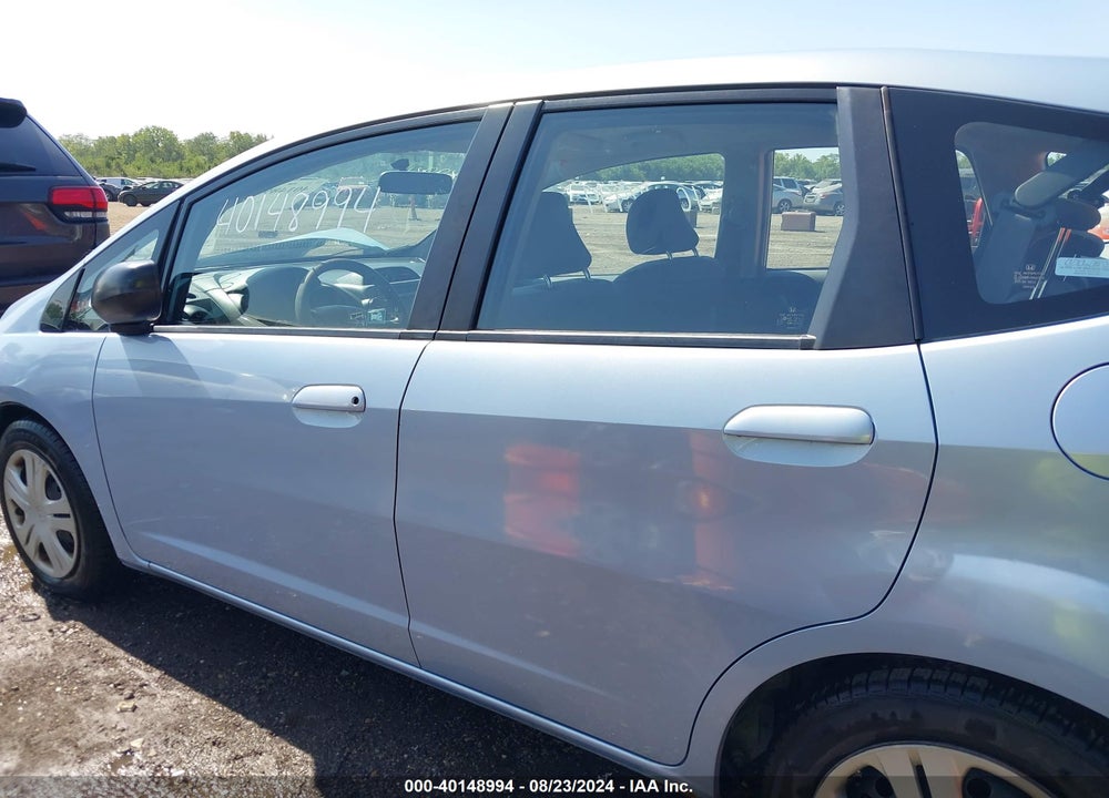 2009 HONDA FIT VIN: JHMGE88279S073998