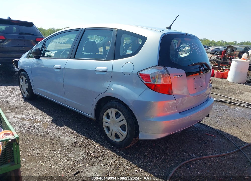 2009 HONDA FIT VIN: JHMGE88279S073998