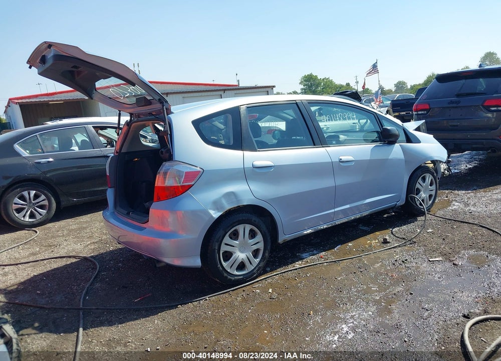 2009 HONDA FIT VIN: JHMGE88279S073998