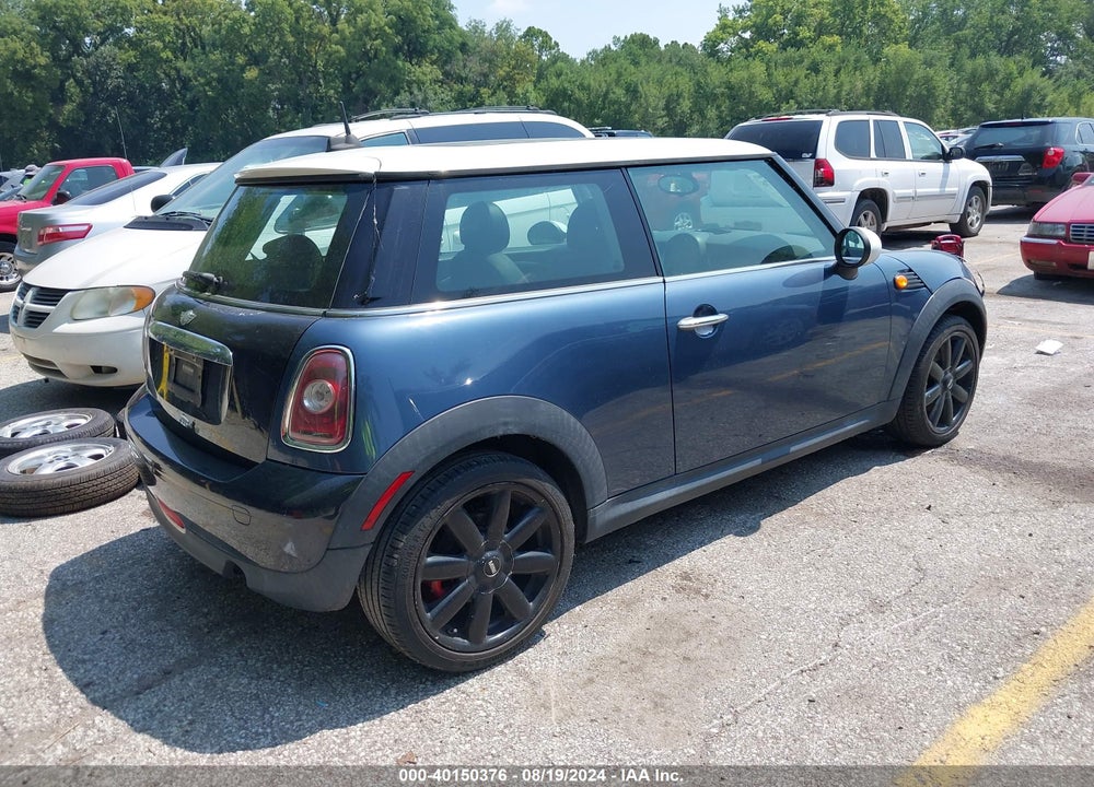 2009 MINI COOPER VIN: WMWMF33539TU74820