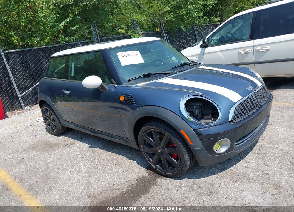 2009 MINI COOPER VIN: WMWMF33539TU74820