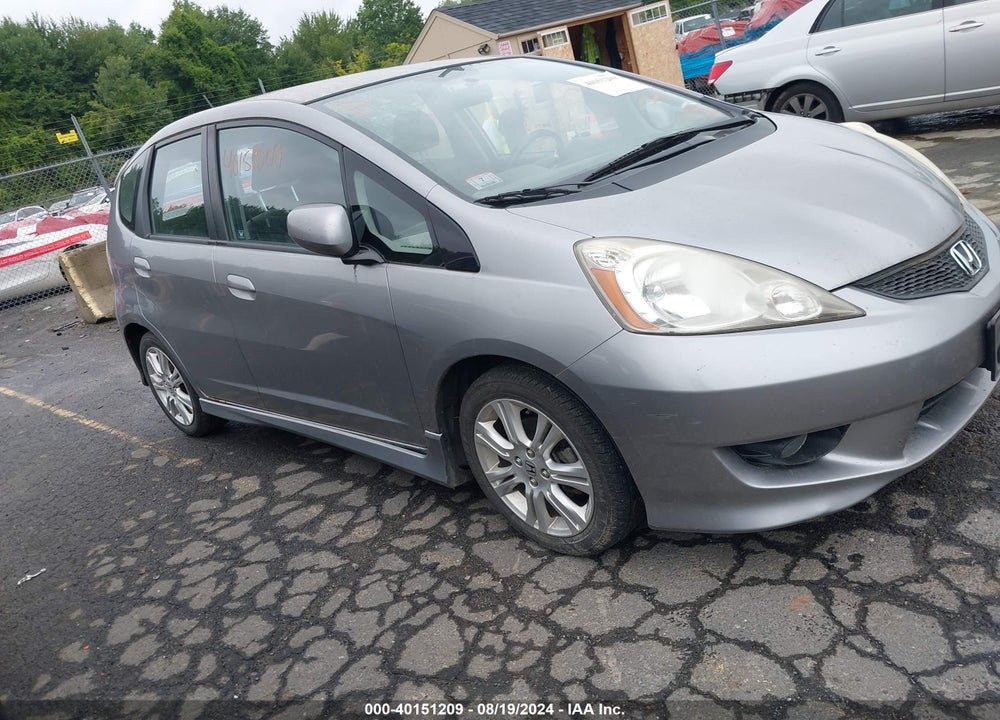 2009 HONDA FIT VIN: JHMGE87489S037823
