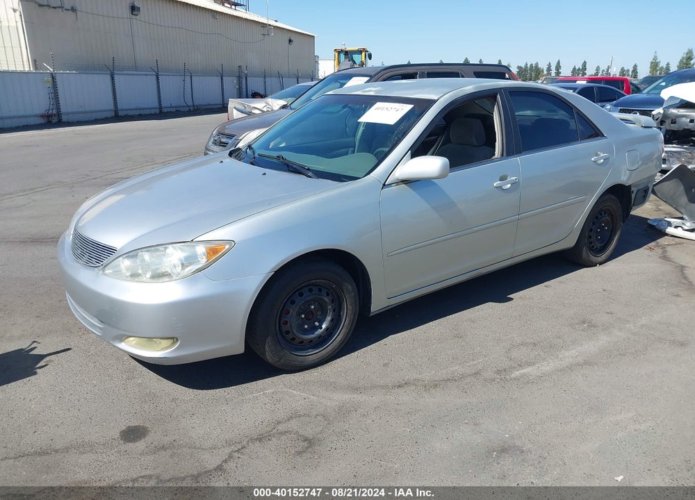2002 TOYOTA CAMRY LE VIN: JTDBE32K720054683