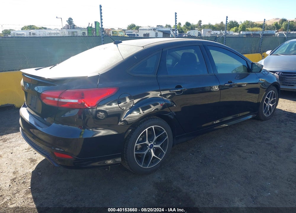 2016 FORD FOCUS SE VIN: 1FADP3F24GL225804