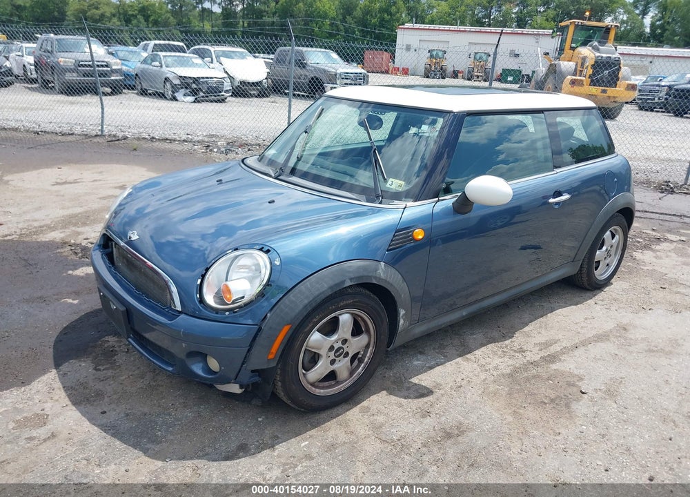 2009 MINI COOPER VIN: WMWMF33519TW76460