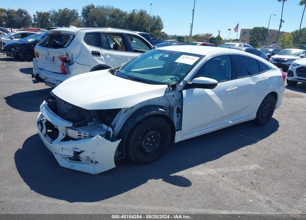 2018 HONDA CIVIC LX VIN: 19XFC2F58JE021056