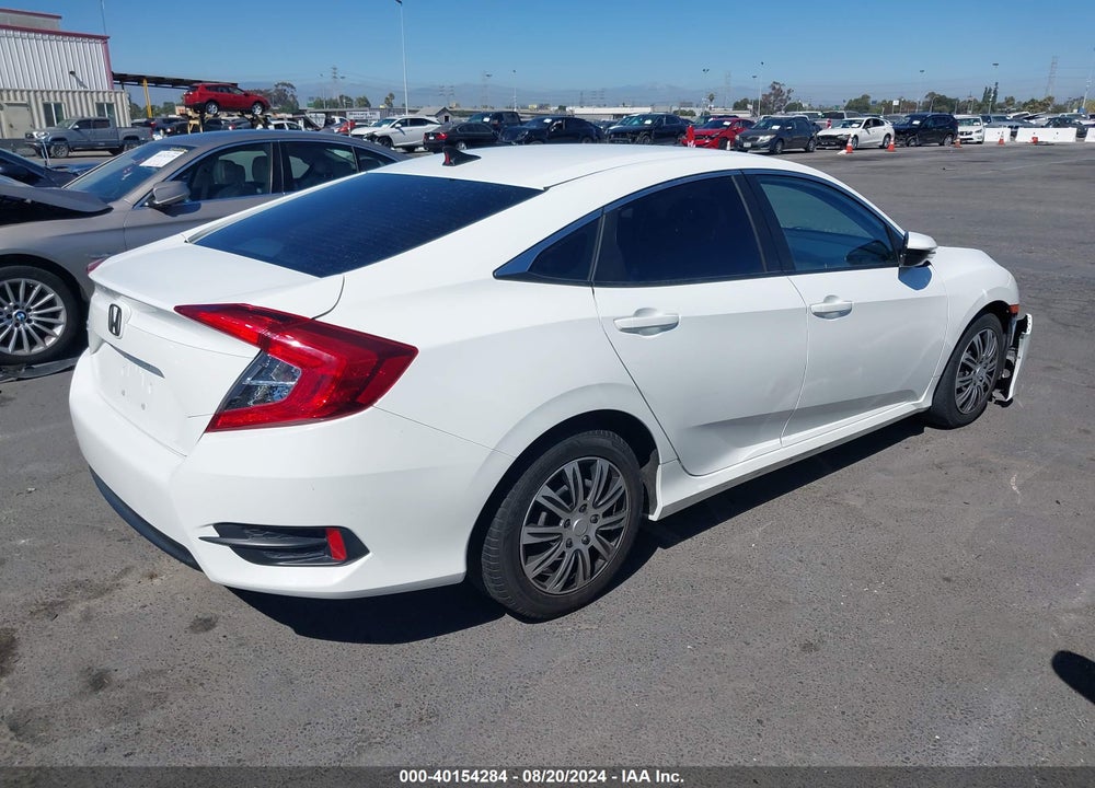 2018 HONDA CIVIC LX VIN: 19XFC2F58JE021056