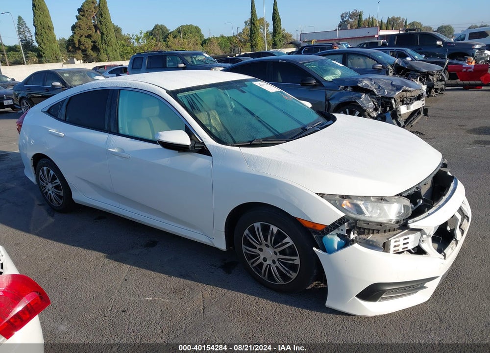 2018 HONDA CIVIC LX VIN: 19XFC2F58JE021056