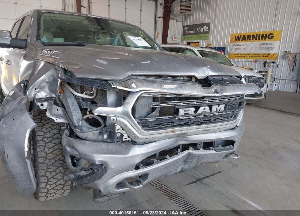 2020 RAM 1500 LIMITED 4X4 5'7 BOX VIN: 1C6SRFHT9LN285568