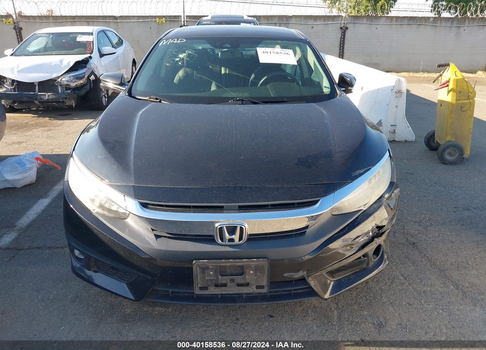 2016 HONDA CIVIC TOURING VIN: 2HGFC1F91GH643526